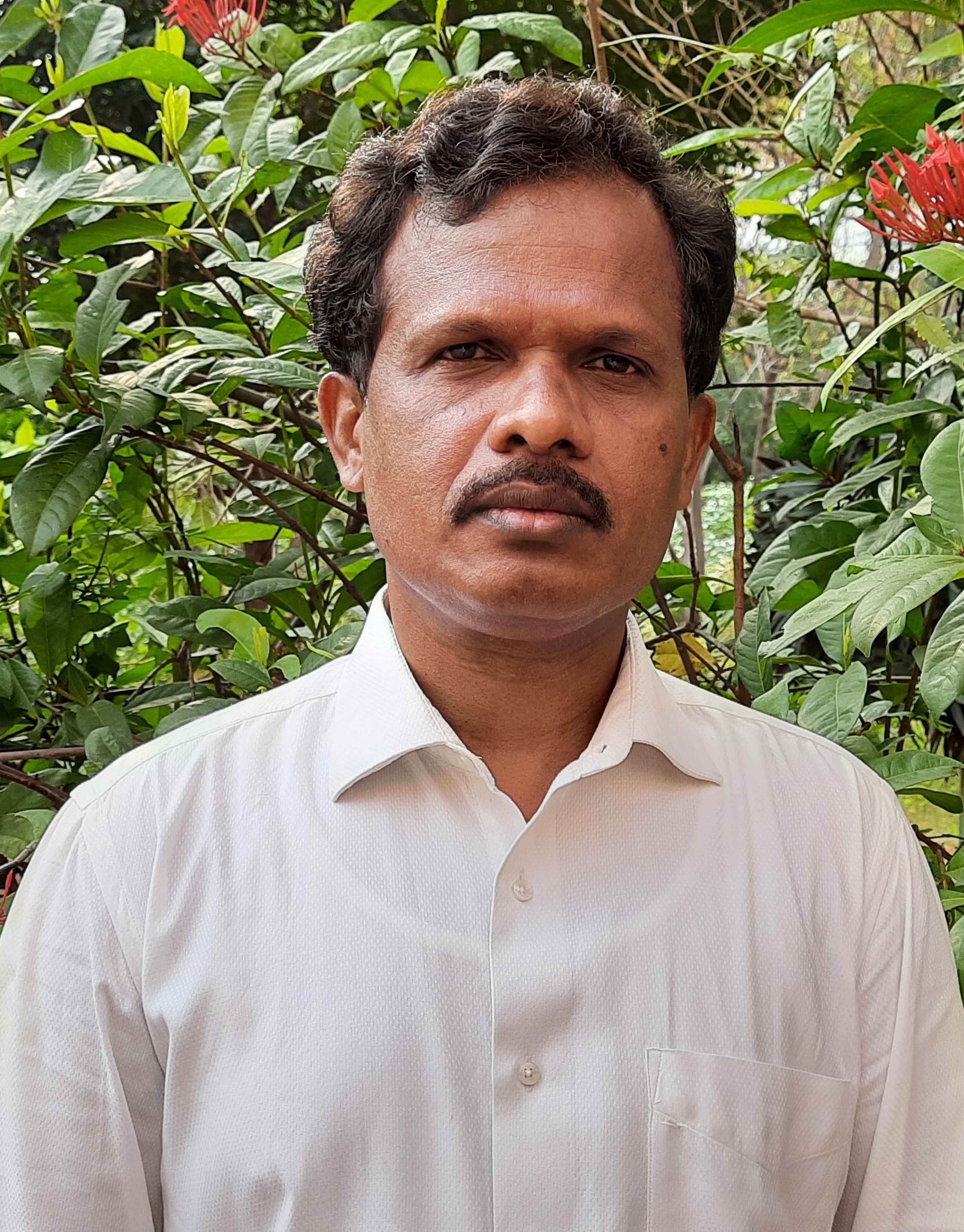 Dr.M. Umapathy